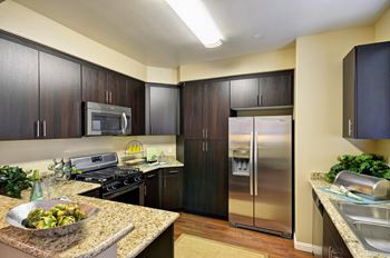 Side-by-side refrigerator with water and ice maker