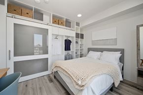 San Diego apartment for rent - a bedroom with a bed and a closet