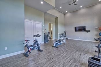 Fitness center with cardio, yoga, and weight room
