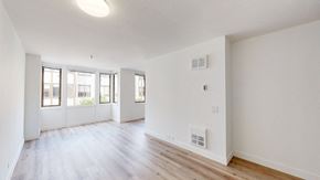 San Francisco apartment for rent - a bedroom with hardwood floors and white walls