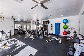 Las Vegas apartment for rent - A well-equipped gym with a variety of exercise machines and weights.
