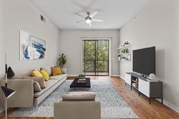 Dallas apartment for rent - a living room with a couch and a tv