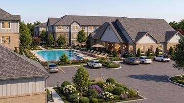 Richmond apartment for rent - A large building with a pool in front of it.