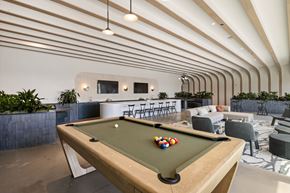 Raleigh apartment for rent - 7th floor entertainment space with large island, ample seating, billiards table and views of the grill deck.