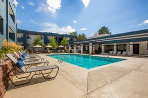 Albuquerque apartment for rent - Pool With Relaxing Chairs at AYA ABQ, Albuquerque, NM, 87109