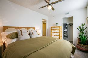 Albuquerque apartment for rent - a bedroom with a bed and a ceiling fan
