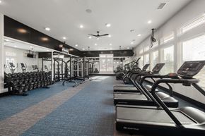 Charlotte apartment for rent - A gym with treadmills and exercise bikes.