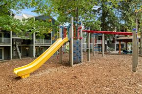 Wilsonville apartment for rent - Playground with yellow slide and climbing structures at Canyon Creek Apartments, Wilsonville, OR 97070