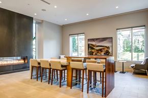 Philadelphia apartment for rent - a dining room with a table and chairs and a fireplace