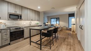 Madison apartment for rent - A modern kitchen with a dining table and chairs.