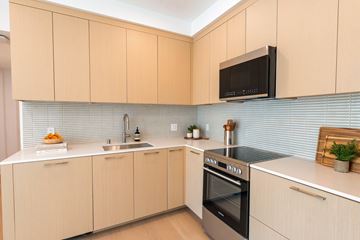 Santa Monica apartment for rent - A kitchen with a black microwave above the stove.