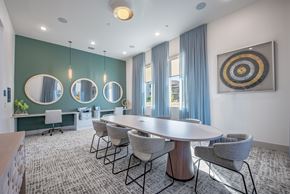 Denton apartment for rent - A conference room with a large table and chairs.