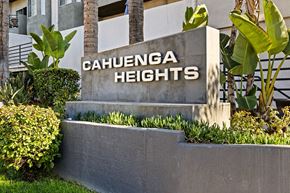 Los Angeles apartment for rent - Property Signage at Cahuenga Heights in front of a building.