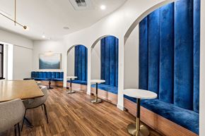 Renton apartment for rent - a dining room with blue booths and tables