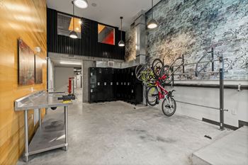 Bike rack with bike hanging
