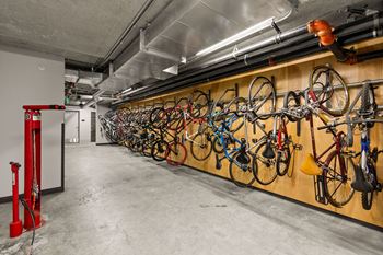Multiple bikes hanging on bike rack