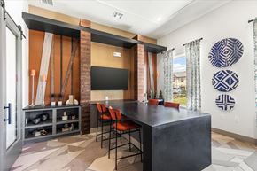 Red Oak apartment for rent - a conference room with a large black table and orange chairs