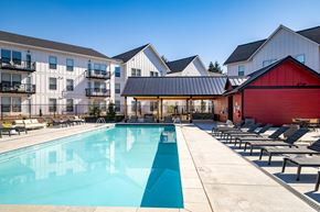 Vancouver apartment for rent - our apartments have a large pool and lounge chairs at The Farmstead, Washington