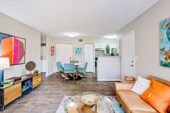 Wood style flooring throughout living, dining and kitchen areas*