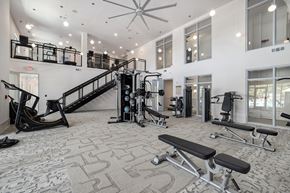 Johns Island apartment for rent - a gym with exercise equipment and a staircase