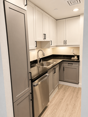 San Francisco apartment for rent - A modern kitchen with a stainless steel refrigerator and wooden flooring.