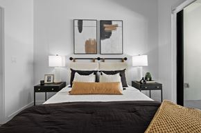Sarasota apartment for rent - A bedroom with a large bed and two nightstands.