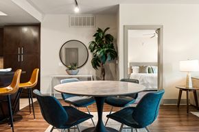 Anaheim apartment for rent - A dining room with a round table and chairs.