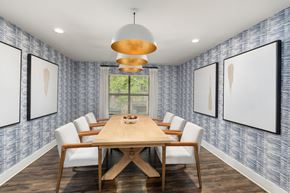 Cary apartment for rent - A dining room with a wooden table and chairs.