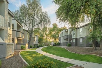 Lush landscaping with green lawns throughout