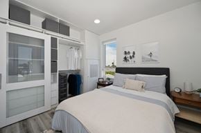 San Diego apartment for rent - a bedroom with a large bed and a closet
