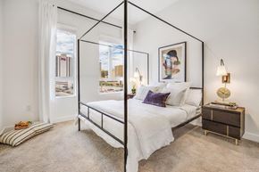 Las Vegas apartment for rent - a bedroom with a large bed and two windows