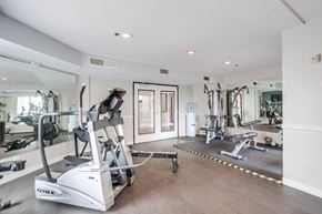 San Diego apartment for rent - A gym with a treadmill and other exercise equipment.