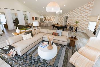 Newly renovated clubroom/wifi lounge with social seating, kitchenette, complimentary coffee bar, billiards & flatscreen tv