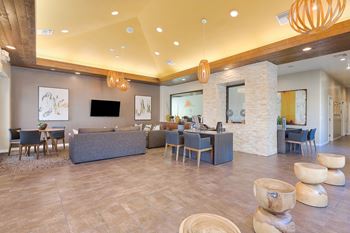 Newly renovated modern clubhouse with social seating, large flat screen tv & coffee bar