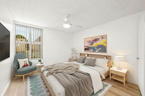 Chula Vista apartment for rent - a bedroom with a large bed and a tv