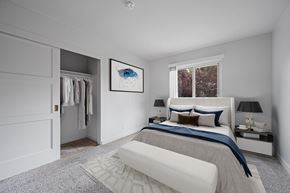 San Mateo apartment for rent - A bedroom with a large bed and a painting on the wall. at Hillsdale Garden, San Mateo, 94403