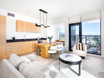 Los Angeles apartment for rent - an open kitchen and living room with a couch and a table