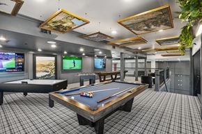 Chandler apartment for rent - A room with a pool table and a snooker table.