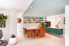 Oceanside apartment for rent - a dining room with a table and chairs and a kitchen