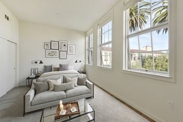 San Francisco apartment for rent - A living room with a grey couch and a coffee table.