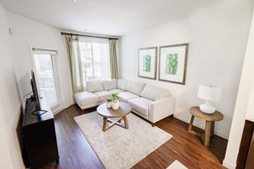 Torrance apartment for rent - a living room with a couch and a table