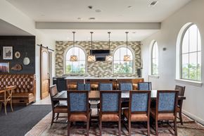 Austin apartment for rent - A dining room with a large table and chairs.