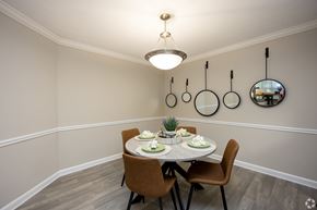 Sandy Springs apartment for rent - A dining room with a round table set for two.