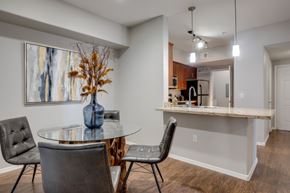 Avondale apartment for rent - A dining room with a glass table and chairs.