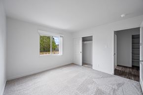 San Mateo apartment for rent - A spacious, empty room with a window and a door at Hillsdale Garden Apartments, CA 94403