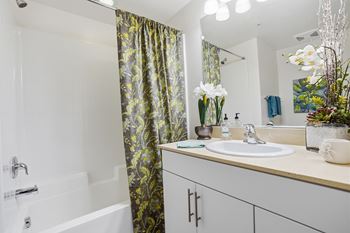 Soaking tubs and spacious showers