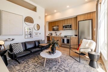 Seattle apartment for rent - a living room with a couch and a table