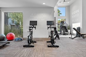 Phoenix apartment for rent - A gym with a motivational quote on the wall.