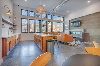 Resident lounge with wifi, tv, fireplace and seating