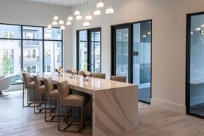 Cary apartment for rent - a dining room with a marble table and chairs in a lobby